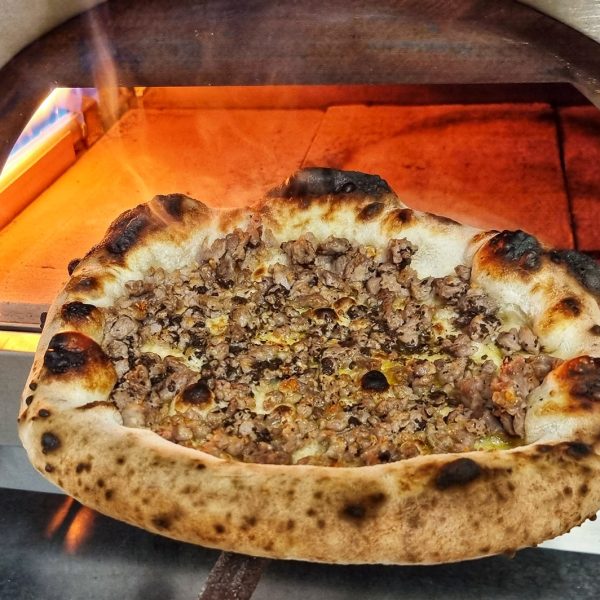 Pizza bakken in Clementi Pizzaoven || Copyright Christopermargiotta