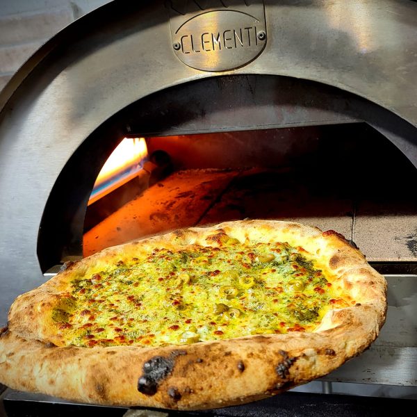 Pizza's thuis bakken in de Clementi oven II Copyright Guyco